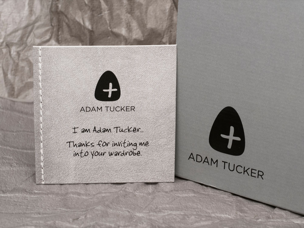 Adam Tucker box packaging and insert