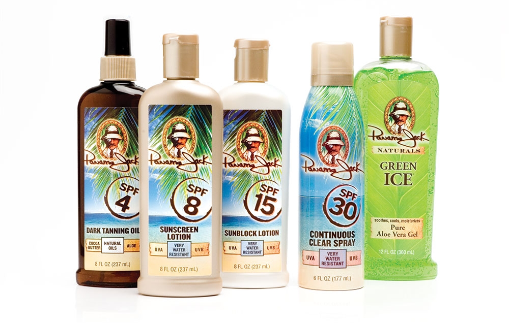 The Panama Jack Sun Care line features shimmering golden and pearl white bottles with rich tropical label graphics.