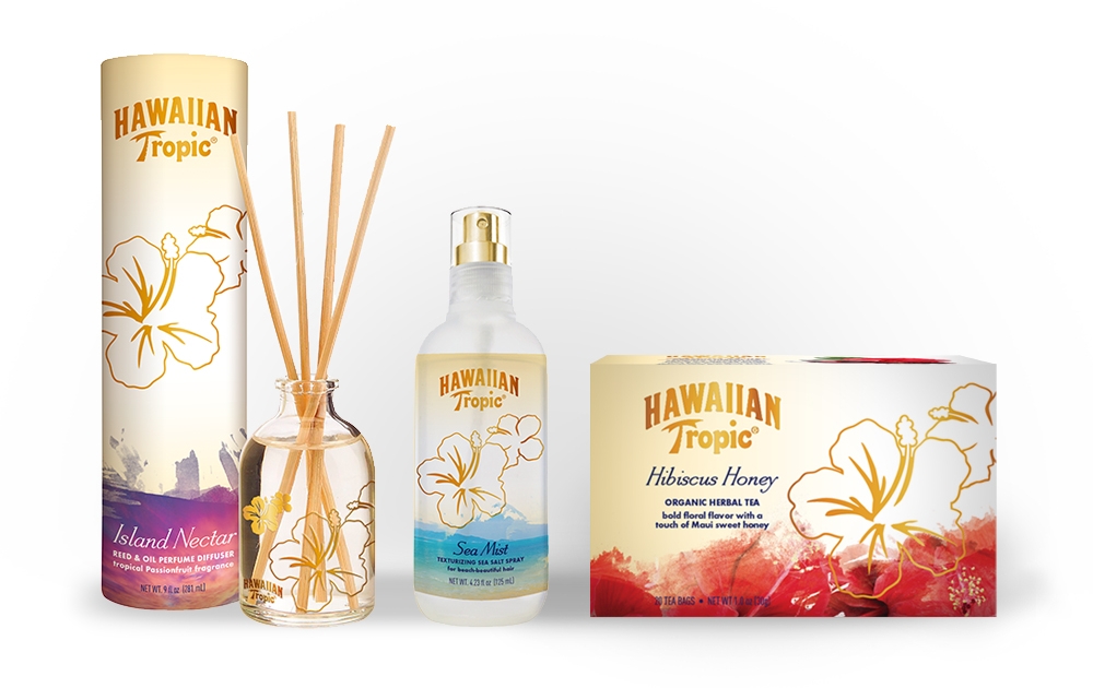 Product packaging incorporates the Hawaiian Tropic signature hibiscus, watercolor colorations and gold metallic accents.