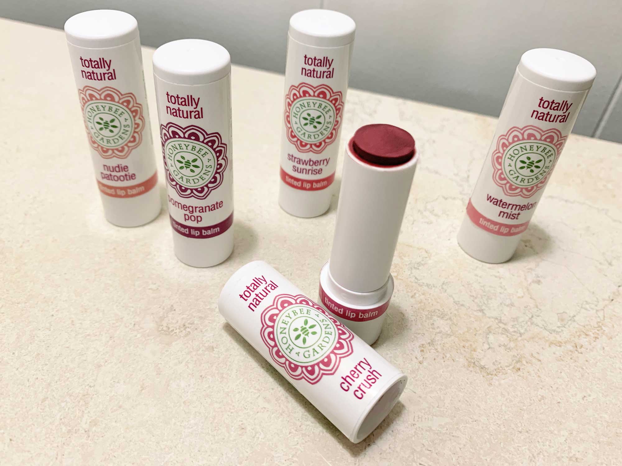 Honeybee Gardens packaging design for the Tinted Lip Balms