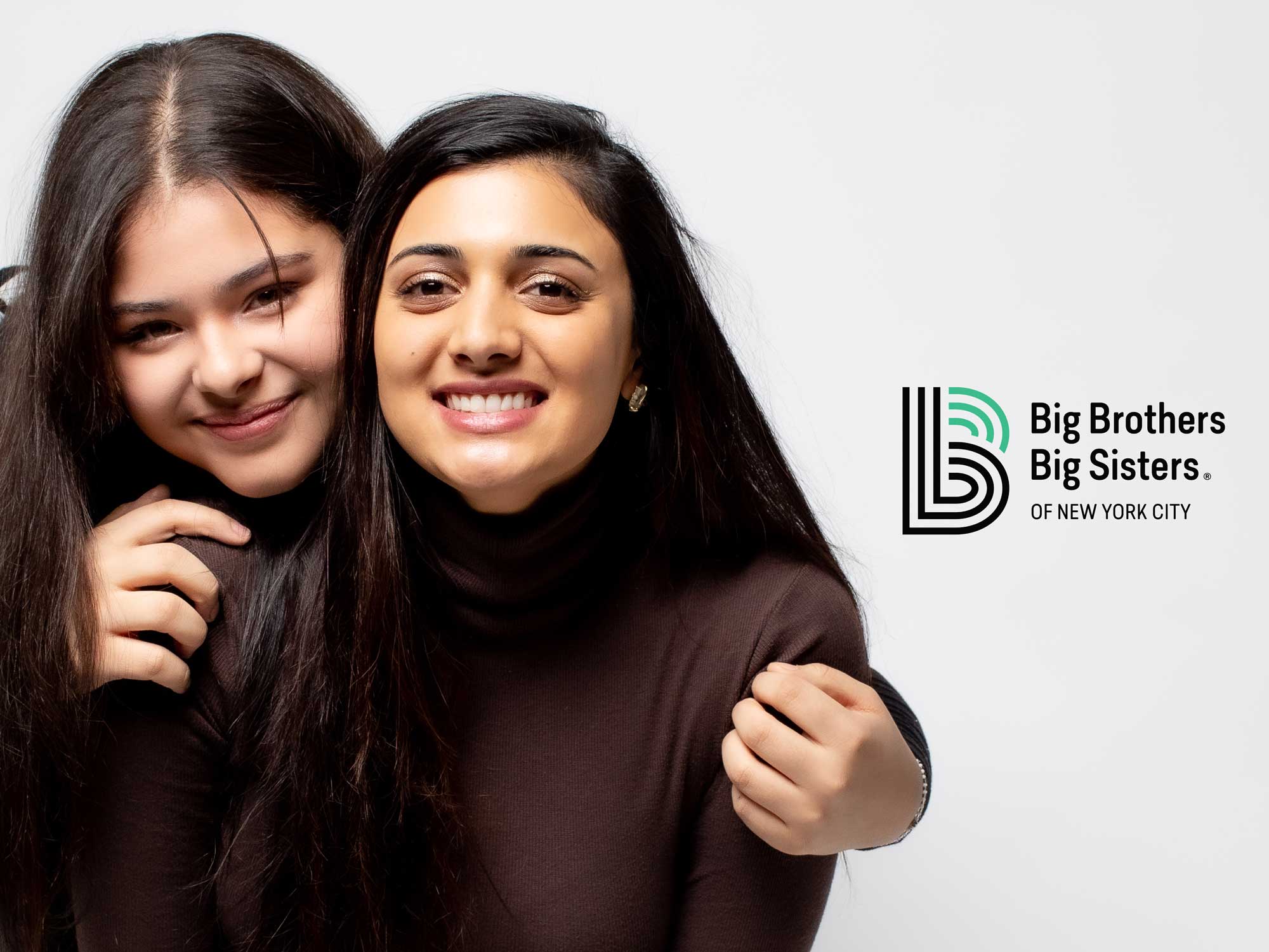 Portrait of Little and Big from Big Brothers Big Sisters of NYC smiling, Big Brothers Big Sisters of NYC Logo