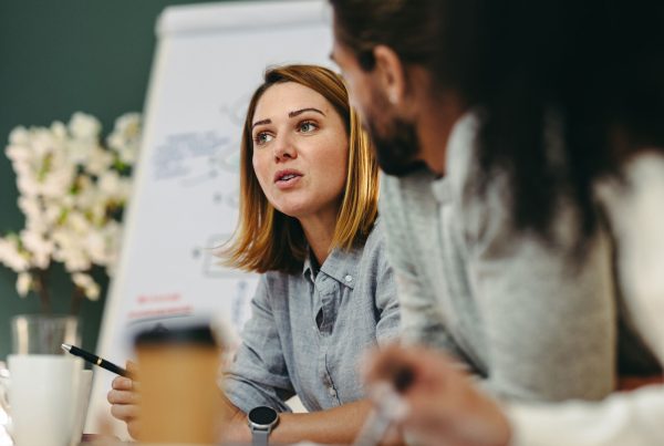 Woman speaking in a meeting